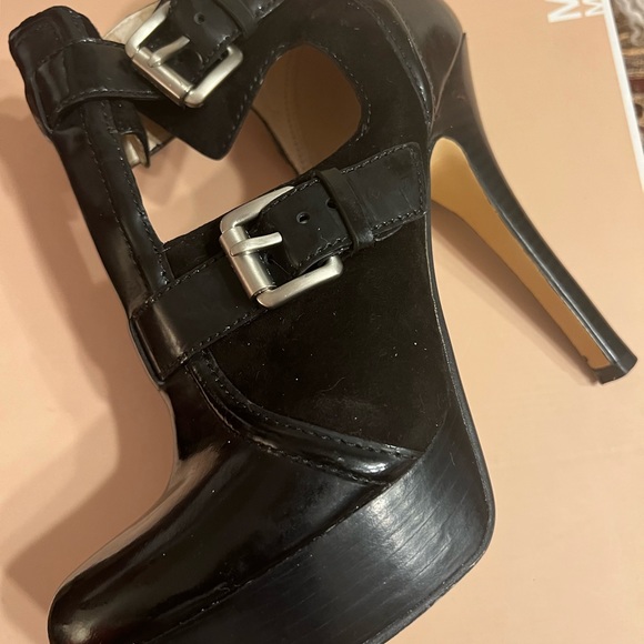 Michael Kors patent leather platform heels. Buckles and ankle height. 
Size 7M - Picture 7 of 16